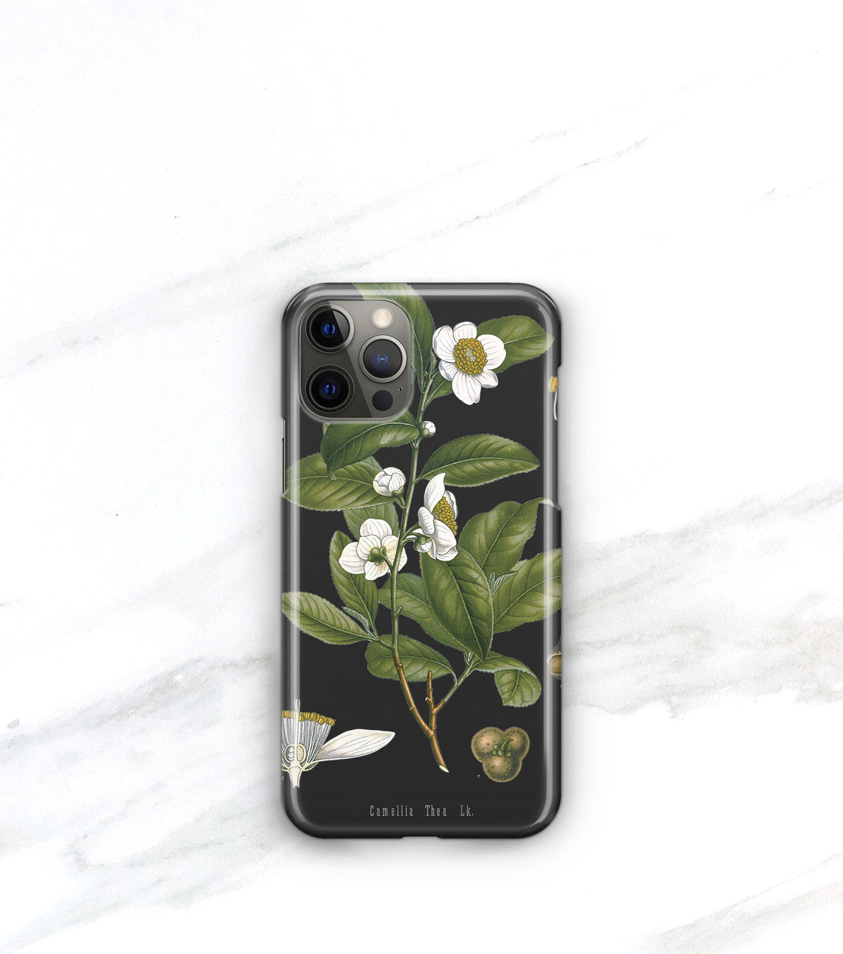 a phone case with a floral design on a marble surface.