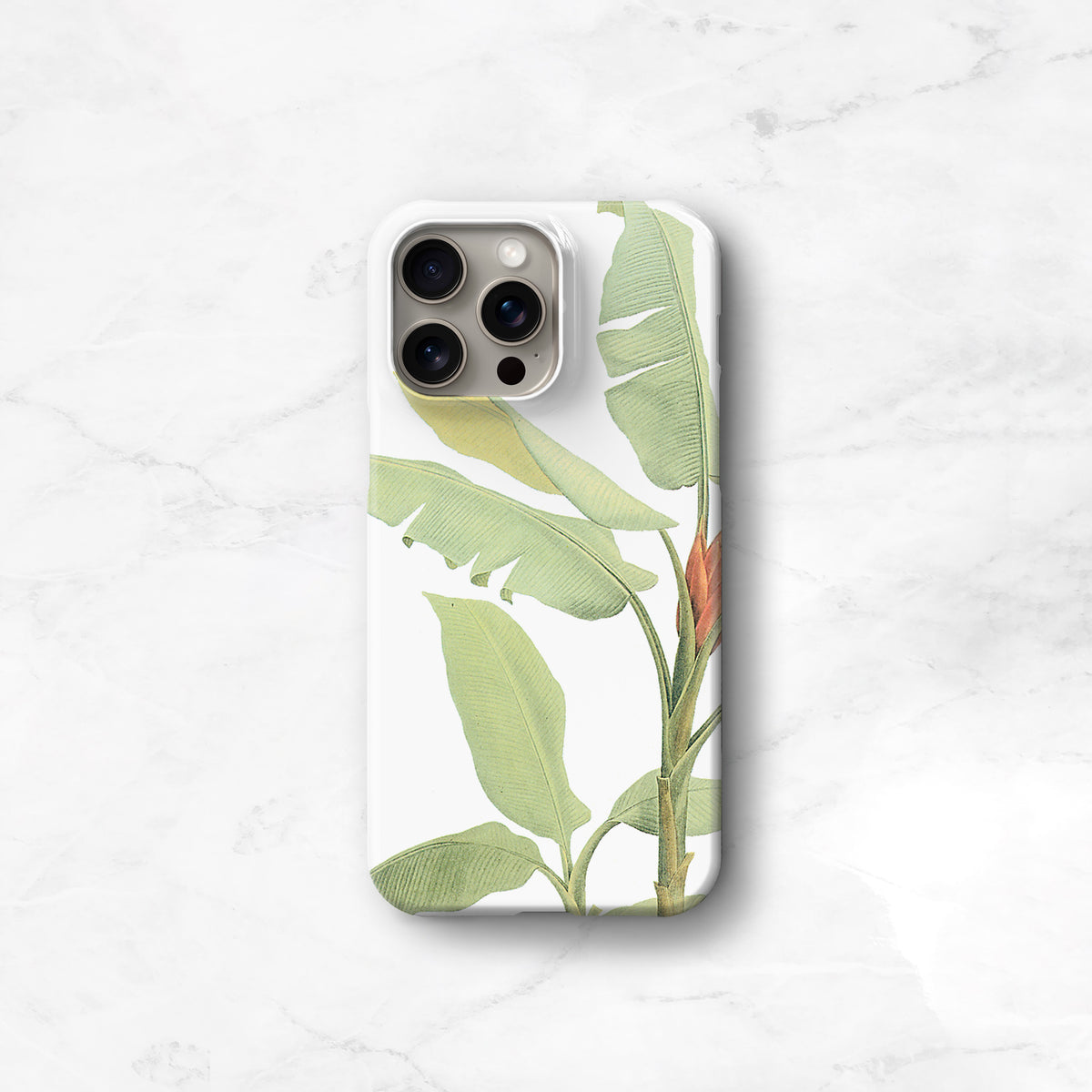 A white phone case with a green leaf design printed on it.