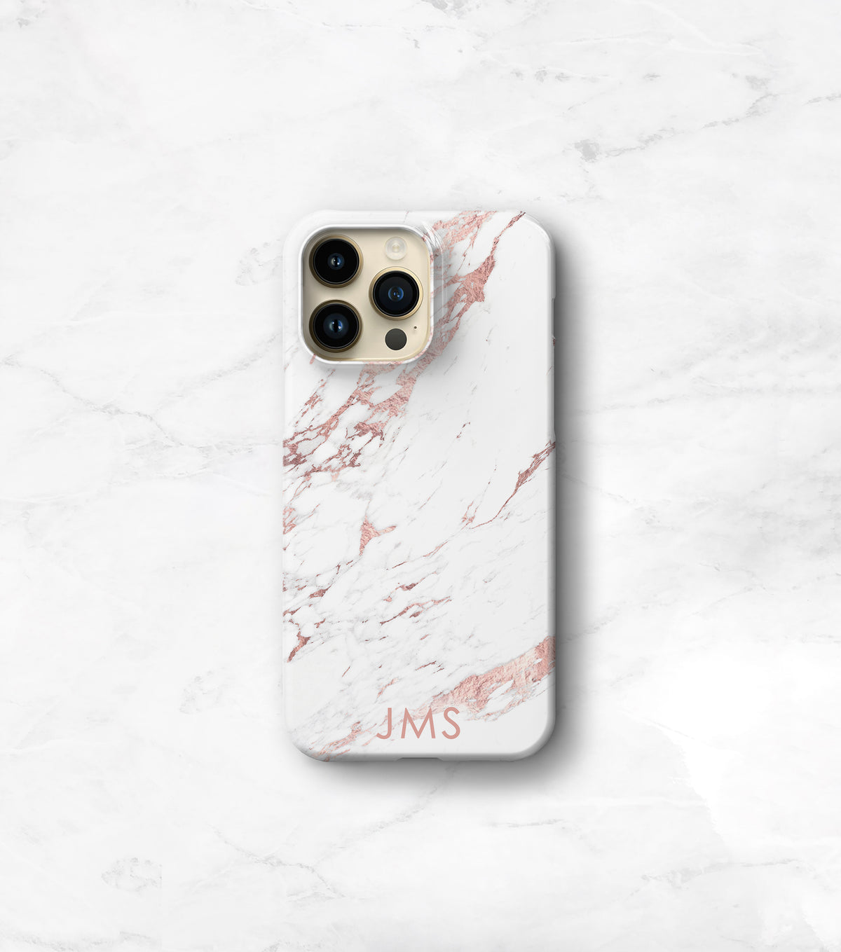 A white marble-patterned iPhone case with a personalized text logo on it, placed on a marble surface.