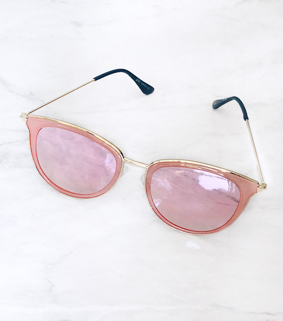 Pink and gold high fashion sunglasses