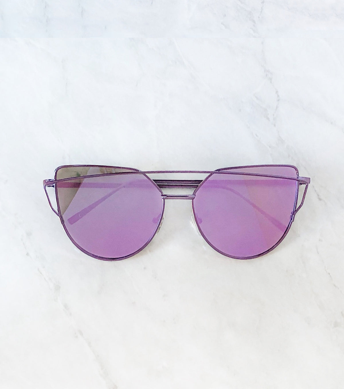 Sunglasses with purple frame and purple lenses