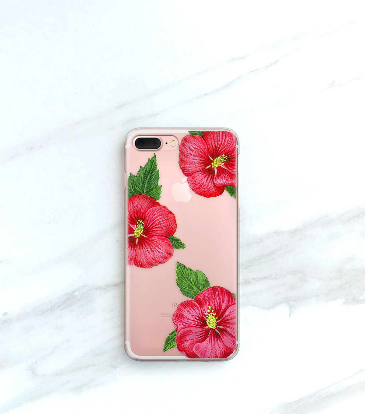 Hawaiian Tropic Clear Case over a rose gold iPhone