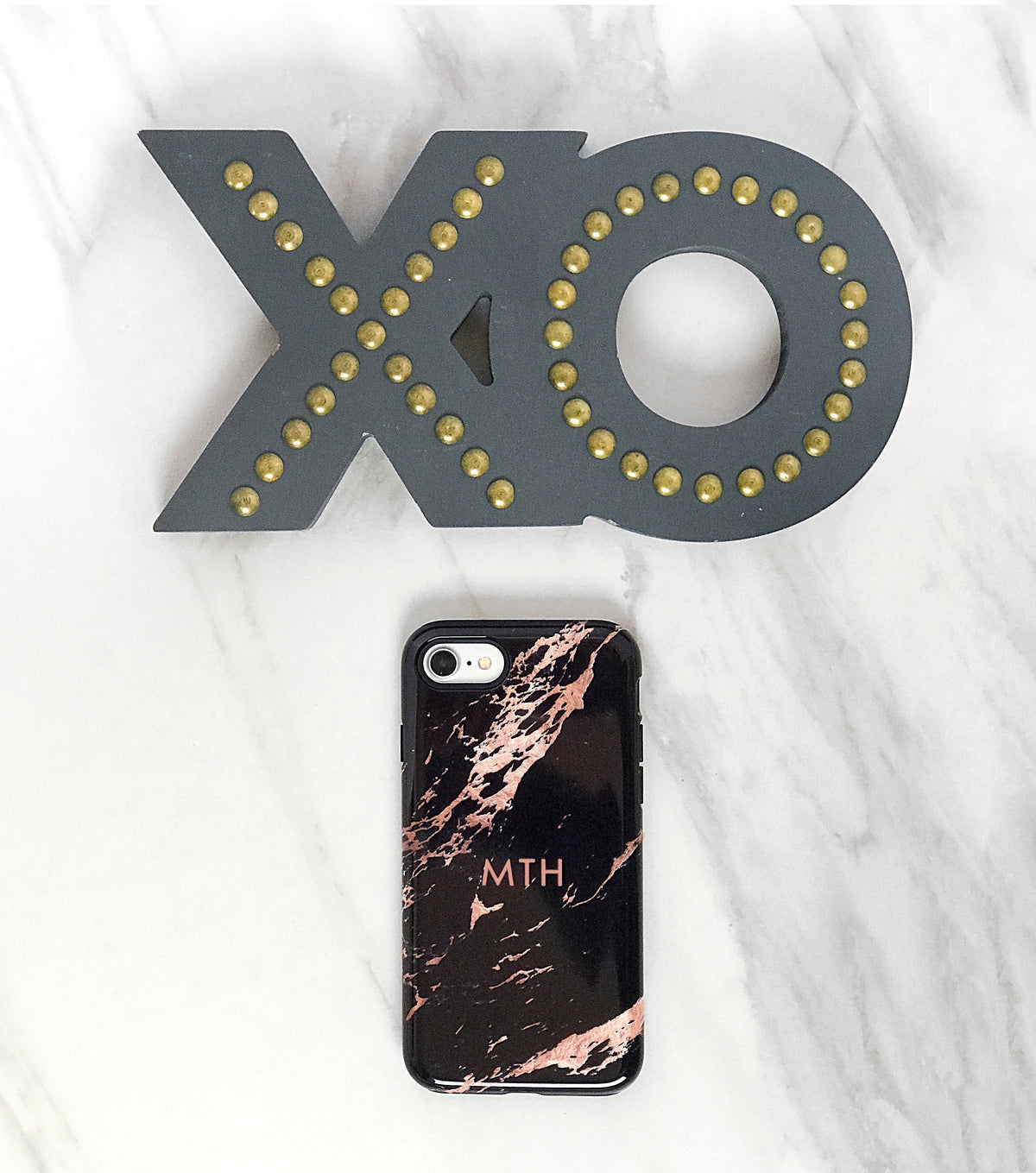 iPhone case in black marble with rose gold veining