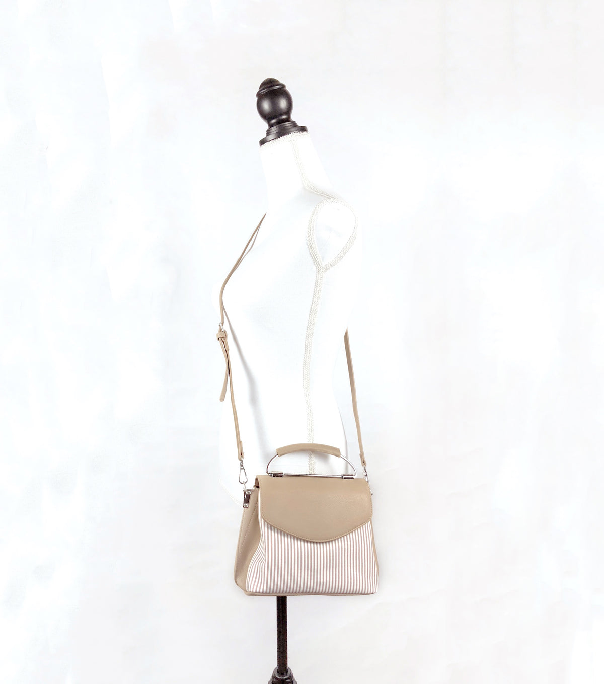 Faux leather crossbody bag for spring neutral stripes